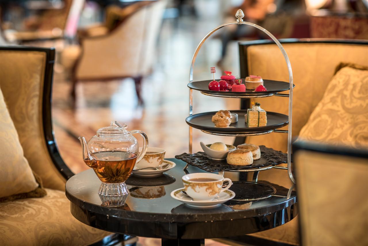 Palazzo Versace Dubai Exterior photo Afternoon tea at the Ritz-Carlton, Dubai
